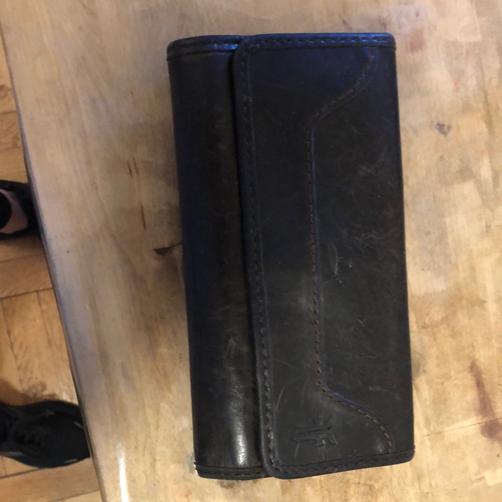 For sale …. Wallet by Frye …… holds a lot very stylish